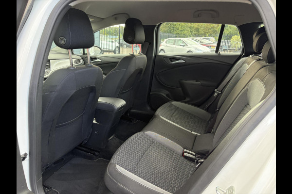 Opel Astra Sports Tourer 1.2 Edition ✓Camera ✓110pk✓2e Eigenaar✓Carplay✓Navi✓Airco✓Cruise✓Pdc✓LED koplampen✓N.A.P.✓6 Bak✓Pdc V+A✓Lm velgen✓Dakdragers ✓Comfortstoelen✓Bj 11-2020✓Apk tot 07-2028