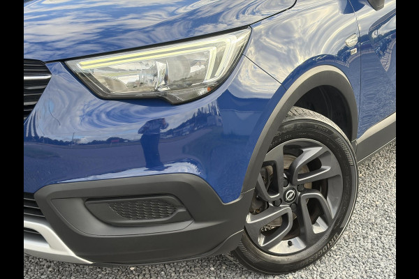 Opel Crossland X 1.2 Turbo 120 Jaar Edition ✓110pk✓D-riem vv in 2025✓2e Eigenaar✓Carplay✓Lm velgen✓N.A.P✓6 Bak✓Airco✓Cruise✓Pdc✓Rijstrooksensor✓Nieuwe Apk bij Aflevering