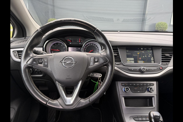 Opel Astra Sports Tourer 1.2 Edition ✓2e Eigenaar✓Trekhaak✓131pk✓Navi✓Airco✓Cruise✓Pdc V+A✓Lm velgen✓Dealer Onderhouden✓Comfortstoelen✓N.A.P✓Apk tot 07-2028