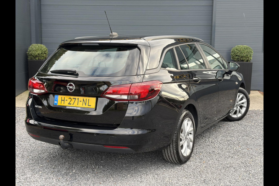 Opel Astra Sports Tourer 1.2 Edition ✓2e Eigenaar✓Trekhaak✓131pk✓Navi✓Airco✓Cruise✓Pdc V+A✓Lm velgen✓Dealer Onderhouden✓Comfortstoelen✓N.A.P✓Apk tot 07-2028