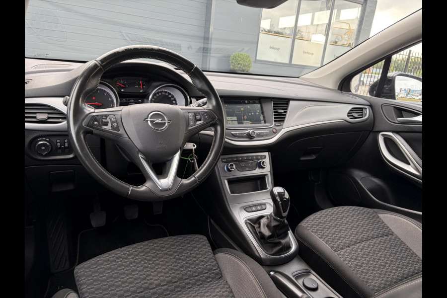 Opel Astra Sports Tourer 1.2 Edition ✓2e Eigenaar✓Trekhaak✓131pk✓Navi✓Airco✓Cruise✓Pdc V+A✓Lm velgen✓Dealer Onderhouden✓Comfortstoelen✓N.A.P✓Apk tot 07-2028