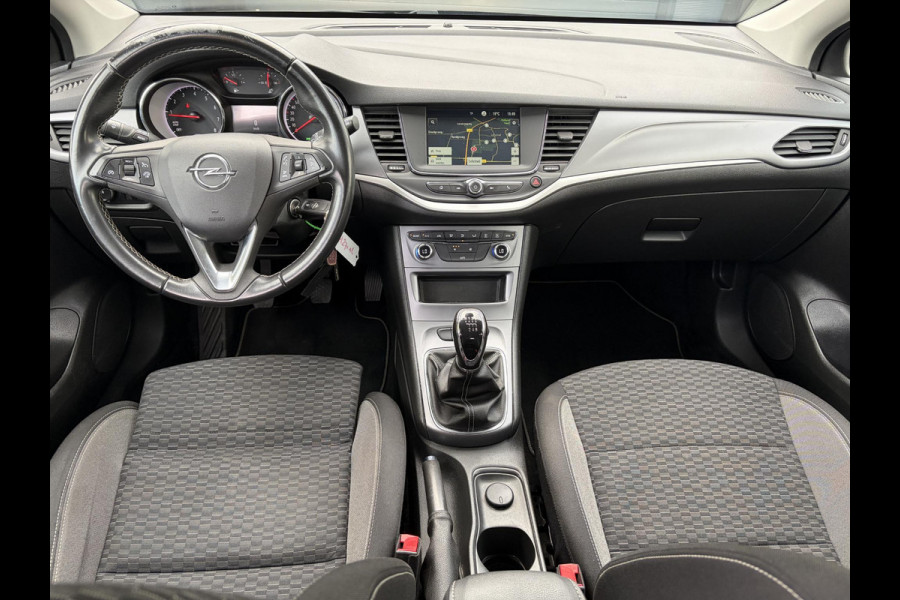 Opel Astra Sports Tourer 1.2 Edition ✓2e Eigenaar✓Trekhaak✓131pk✓Navi✓Airco✓Cruise✓Pdc V+A✓Lm velgen✓Dealer Onderhouden✓Comfortstoelen✓N.A.P✓Apk tot 07-2028