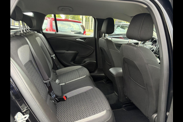 Opel Astra Sports Tourer 1.2 Edition ✓2e Eigenaar✓Trekhaak✓131pk✓Navi✓Airco✓Cruise✓Pdc V+A✓Lm velgen✓Dealer Onderhouden✓Comfortstoelen✓N.A.P✓Apk tot 07-2028