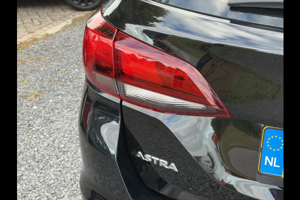Opel Astra Sports Tourer 1.2 Edition ✓2e Eigenaar✓Trekhaak✓131pk✓Navi✓Airco✓Cruise✓Pdc V+A✓Lm velgen✓Dealer Onderhouden✓Comfortstoelen✓N.A.P✓Apk tot 07-2028