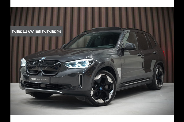 BMW iX3 High Executive 80 kWh | Panoramadak | Harman Kardon | Stoelverwarming | Adaptive Cruise Control | Head-Up Display | Memory Seat | 360 Camera | Ambiance Verlichting | Adaptief Onderstel | Adaptive LED | Trekhaak |