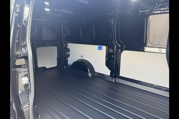 Ford E-Transit Custom 340 L2H1 Limited 71 kWh | SCI | 218pk | Laadvloer bescherming | 12-weg verstel- en verwarmbare AGR bestuurders- en passagiersstoel Laadvloer bescherming,12-weg verstel- en verwarmbare AGR bestuurders- en passagiersstoel | Trekhaakvoorbereiding | 17 inch lichtmetalen velgen (Carbonised Grey) | Driver Assistent Pack Ultimate | AGM accu | BEV 3-fase oplaadkabel (mode 3, 32A, 10m)