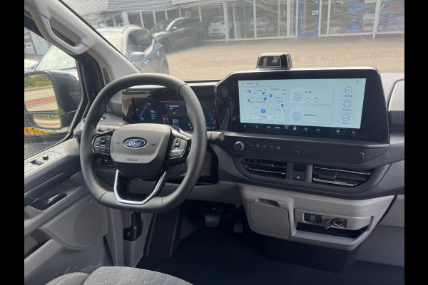 Ford E-Transit Custom 340 L2H1 Limited 71 kWh | SCI | 218pk | Laadvloer bescherming | 12-weg verstel- en verwarmbare AGR bestuurders- en passagiersstoel Laadvloer bescherming,12-weg verstel- en verwarmbare AGR bestuurders- en passagiersstoel | Trekhaakvoorbereiding | 17 inch lichtmetalen velgen (Carbonised Grey) | Driver Assistent Pack Ultimate | AGM accu | BEV 3-fase oplaadkabel (mode 3, 32A, 10m)
