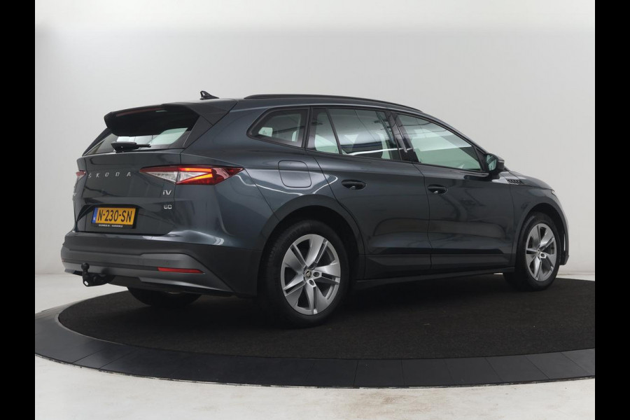 Škoda Enyaq iV 60 | SOH 93,0% | Half leder | Cruise control | Carplay | Climate control | Lane assist | Park assist | Trekhaak | Sfeerverlichting | Navigatie | Bluetooth