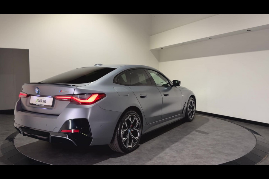 BMW i4 M50 84 kWh M Sport Pro | SOH 97,6% | el. Schuif/kanteldak | el. stoelen met memory | HUD | Unieke kleur