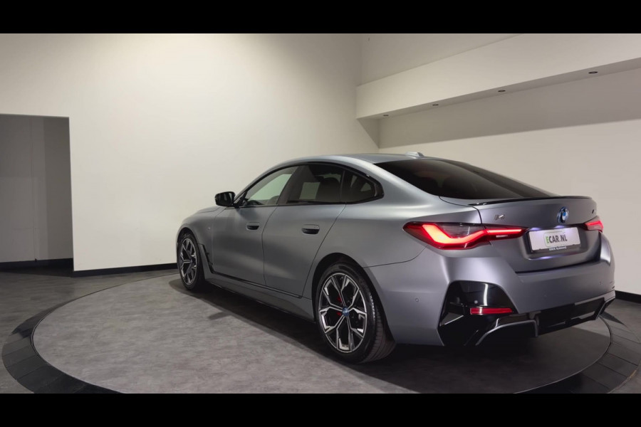 BMW i4 M50 84 kWh M Sport Pro | SOH 97,6% | el. Schuif/kanteldak | el. stoelen met memory | HUD | Unieke kleur