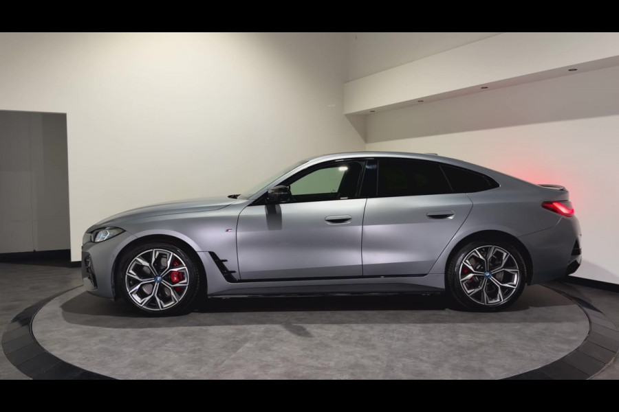 BMW i4 M50 84 kWh M Sport Pro | SOH 97,6% | el. Schuif/kanteldak | el. stoelen met memory | HUD | Unieke kleur