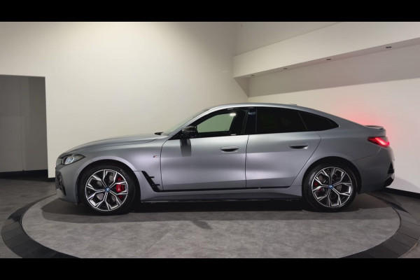 BMW i4 M50 84 kWh M Sport Pro | SOH 97,6% | el. Schuif/kanteldak | el. stoelen met memory | HUD | Unieke kleur