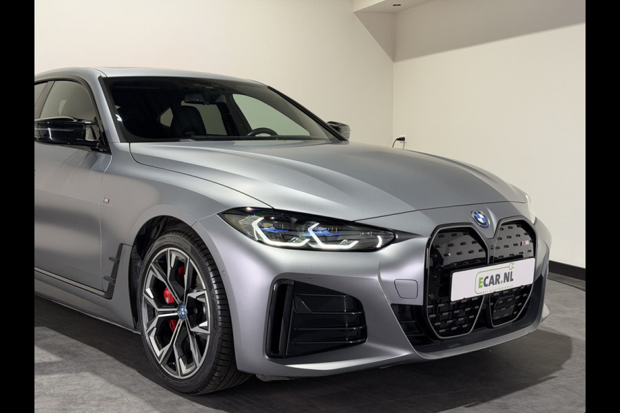 BMW i4 M50 84 kWh M Sport Pro | SOH 97,6% | el. Schuif/kanteldak | el. stoelen met memory | HUD | Unieke kleur