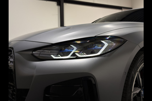 BMW i4 M50 84 kWh M Sport Pro | SOH 97,6% | el. Schuif/kanteldak | el. stoelen met memory | HUD | Unieke kleur