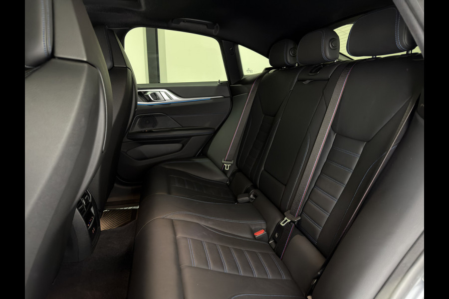 BMW i4 M50 84 kWh M Sport Pro | SOH 97,6% | el. Schuif/kanteldak | el. stoelen met memory | HUD | Unieke kleur