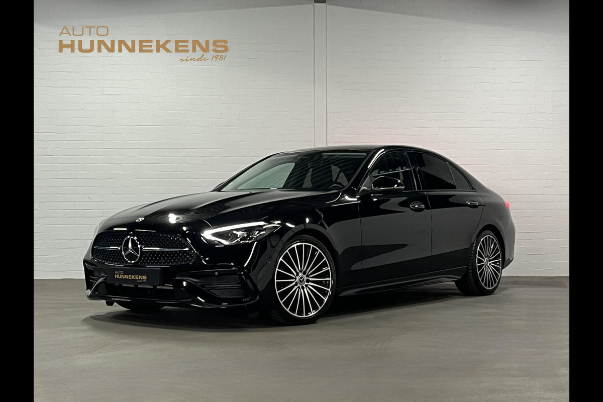 Mercedes-Benz C-Klasse 180 AMG Line Ambiente verlichting | Cruise control | Stoelverwarming | Achteruitrij camera | AMG wielen | Carplay | Dodehoek | Navigatie