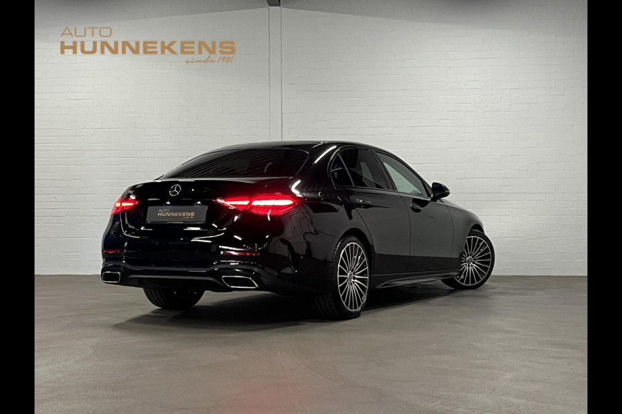 Mercedes-Benz C-Klasse 180 AMG Line Ambiente verlichting | Cruise control | Stoelverwarming | Achteruitrij camera | AMG wielen | Carplay | Dodehoek | Navigatie
