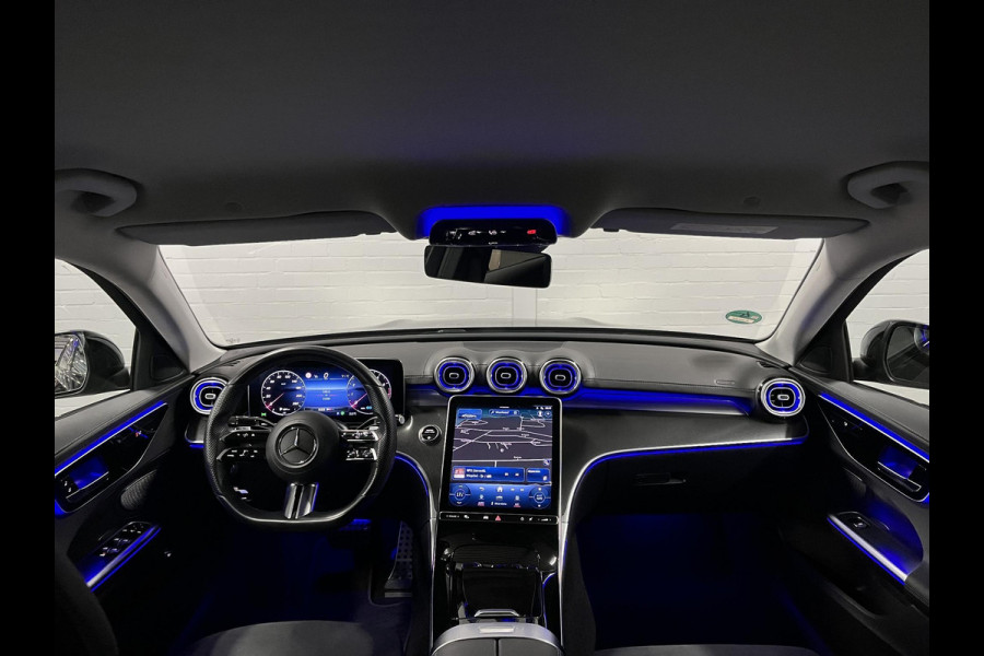 Mercedes-Benz C-Klasse 180 AMG Line Ambiente verlichting | Cruise control | Stoelverwarming | Achteruitrij camera | AMG wielen | Carplay | Dodehoek | Navigatie