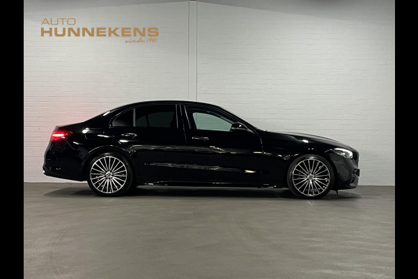 Mercedes-Benz C-Klasse 180 AMG Line Ambiente verlichting | Cruise control | Stoelverwarming | Achteruitrij camera | AMG wielen | Carplay | Dodehoek | Navigatie