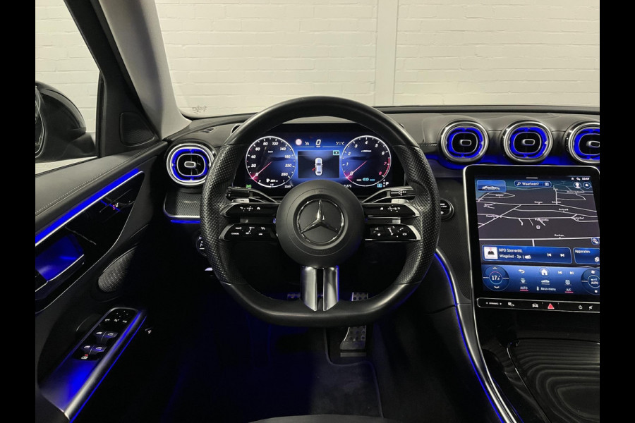 Mercedes-Benz C-Klasse 180 AMG Line Ambiente verlichting | Cruise control | Stoelverwarming | Achteruitrij camera | AMG wielen | Carplay | Dodehoek | Navigatie
