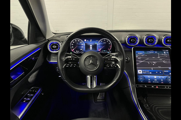 Mercedes-Benz C-Klasse 180 AMG Line Ambiente verlichting | Cruise control | Stoelverwarming | Achteruitrij camera | AMG wielen | Carplay | Dodehoek | Navigatie
