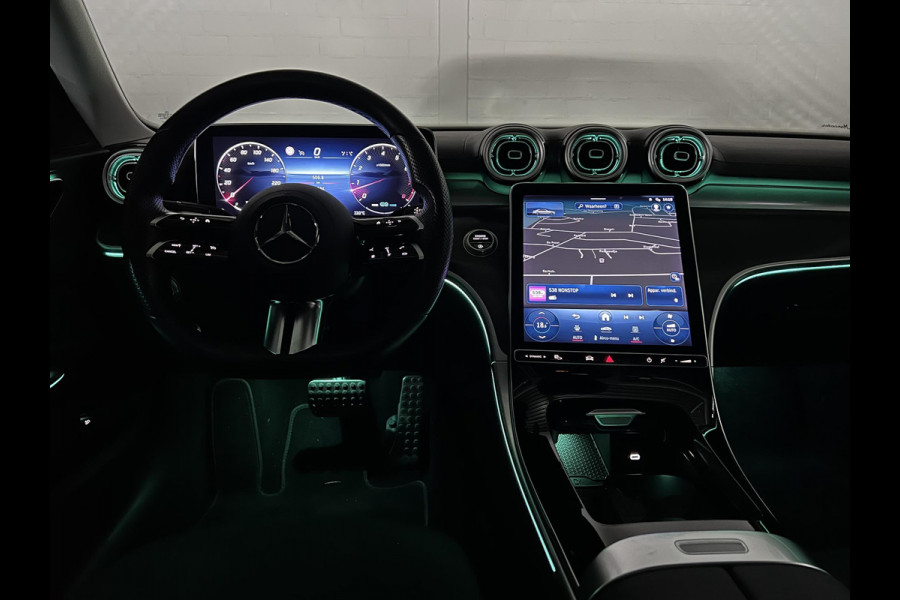 Mercedes-Benz C-Klasse 180 AMG Line Ambiente verlichting | Cruise control | Stoelverwarming | Achteruitrij camera | AMG wielen | Carplay | Dodehoek | Navigatie