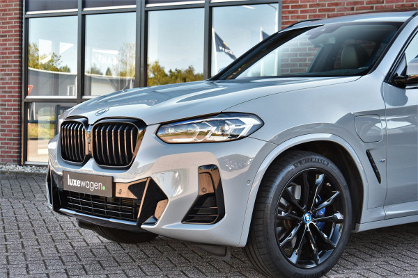 BMW X3 xDrive30e M-Sport Pano Trekh HUD E-zetels 360-cam Gesture