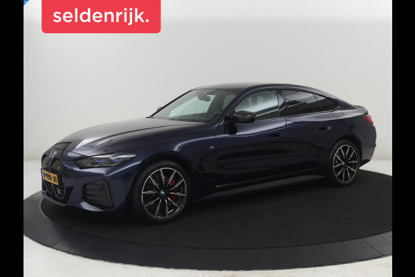 BMW i4 M50 High Executive 84 kWh | SOH 94,4% | Leder | Adaptive cruise | xDrive |  Stoelverwarming | Head-up | Harman/Kardon | Carplay | Sfeerverlichting | 360 camera | Park assist | Elektrische achterklep