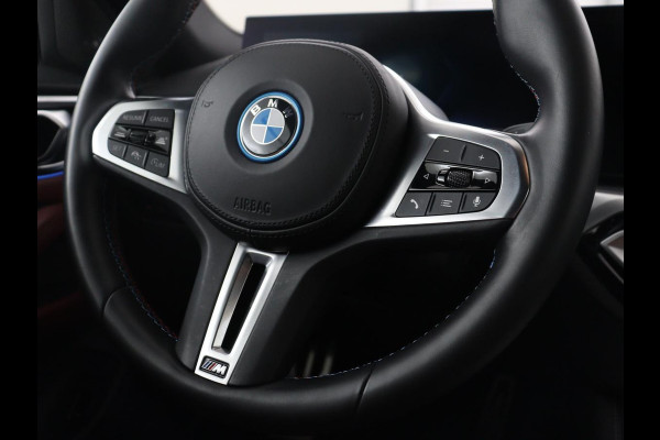 BMW i4 M50 High Executive 84 kWh | SOH 94,4% | Leder | Adaptive cruise | xDrive |  Stoelverwarming | Head-up | Harman/Kardon | Carplay | Sfeerverlichting | 360 camera | Park assist | Elektrische achterklep