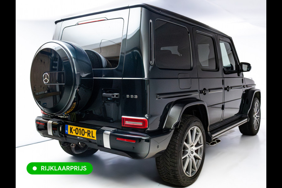 Mercedes-Benz G-Klasse 63 AMG Prem.Plus | Elek. schuif-/kanteldak | Burmester High end | Stoelverw. & koeling | Memory stoelen | Adap. cruise | Trekhaak, Treeplanken, Alcantara hemel, 360 Camera, Massagestoelen, NL auto, Volledig dealer onderhouden.