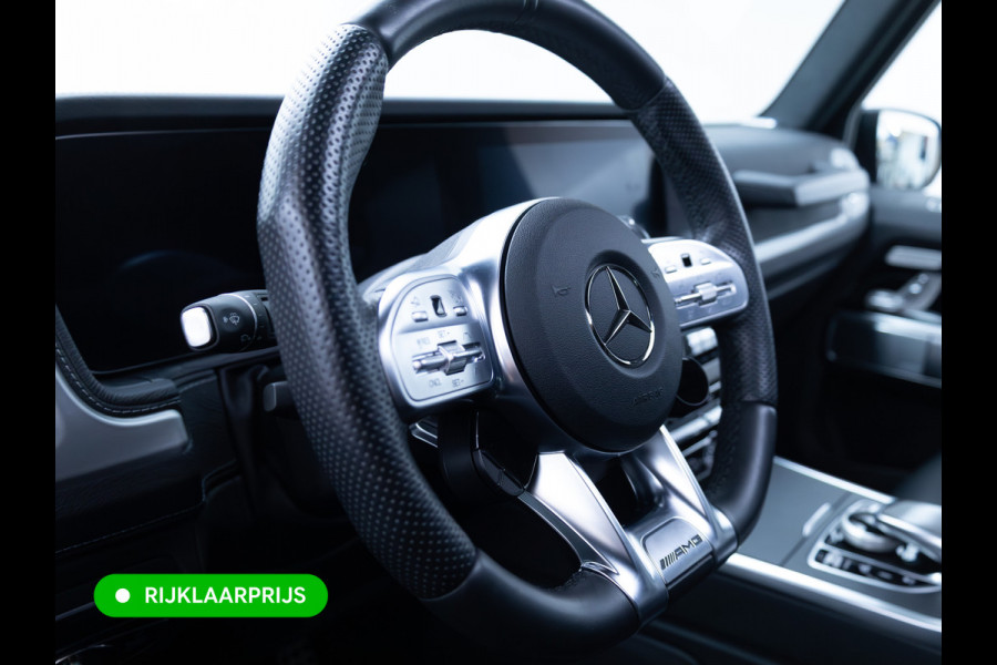 Mercedes-Benz G-Klasse 63 AMG Prem.Plus | Elek. schuif-/kanteldak | Burmester High end | Stoelverw. & koeling | Memory stoelen | Adap. cruise | Trekhaak, Treeplanken, Alcantara hemel, 360 Camera, Massagestoelen, NL auto, Volledig dealer onderhouden.