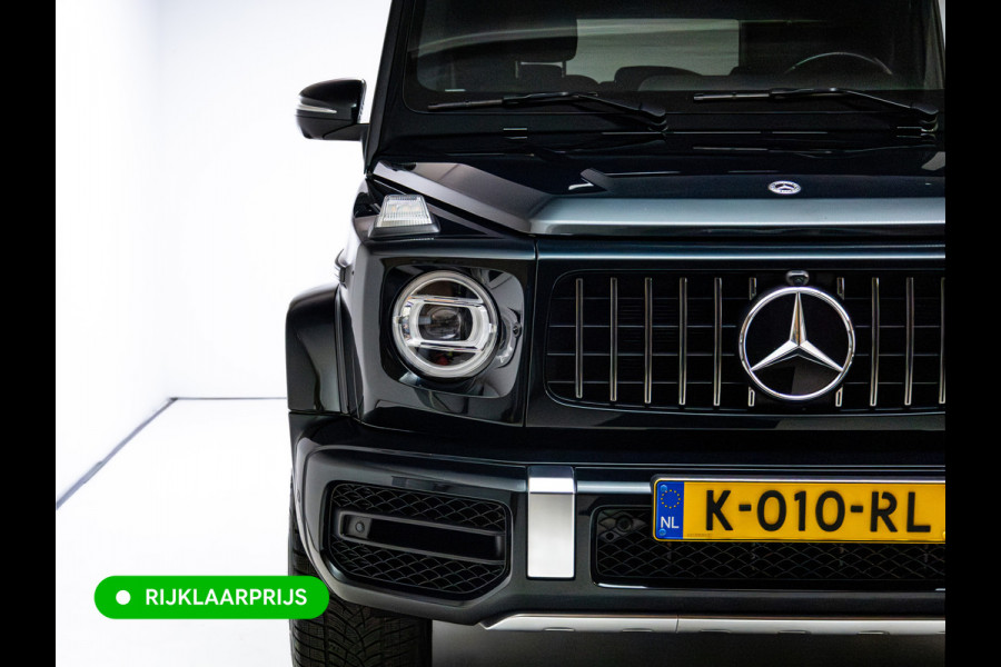 Mercedes-Benz G-Klasse 63 AMG Prem.Plus | Elek. schuif-/kanteldak | Burmester High end | Stoelverw. & koeling | Memory stoelen | Adap. cruise | Trekhaak, Treeplanken, Alcantara hemel, 360 Camera, Massagestoelen, NL auto, Volledig dealer onderhouden.