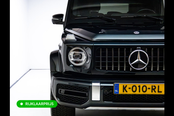 Mercedes-Benz G-Klasse 63 AMG Prem.Plus | Elek. schuif-/kanteldak | Burmester High end | Stoelverw. & koeling | Memory stoelen | Adap. cruise | Trekhaak, Treeplanken, Alcantara hemel, 360 Camera, Massagestoelen, NL auto, Volledig dealer onderhouden.