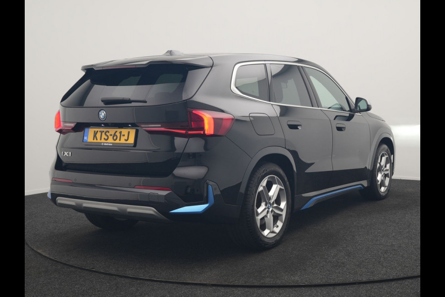 BMW iX1 xDrive30 X Line 67 kWh 313pk Dealer O.H. | Trekhaak Af Fabriek | Adaptive Cruise | Lederen Sportstoelen Massage & Verwarmd | Camera | Adaptief M-onderstel | Blis | Sfeerverlichting | Apple Carplay | Navigatie | DAB |