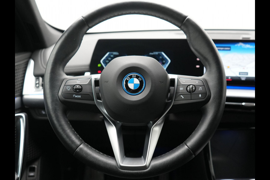 BMW iX1 xDrive30 X Line 67 kWh 313pk Dealer O.H. | Trekhaak Af Fabriek | Adaptive Cruise | Lederen Sportstoelen Massage & Verwarmd | Camera | Adaptief M-onderstel | Blis | Sfeerverlichting | Apple Carplay | Navigatie | DAB |