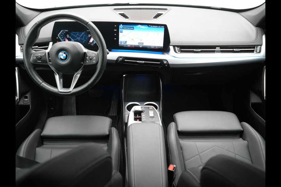 BMW iX1 xDrive30 X Line 67 kWh 313pk Dealer O.H. | Trekhaak Af Fabriek | Adaptive Cruise | Lederen Sportstoelen Massage & Verwarmd | Camera | Adaptief M-onderstel | Blis | Sfeerverlichting | Apple Carplay | Navigatie | DAB |