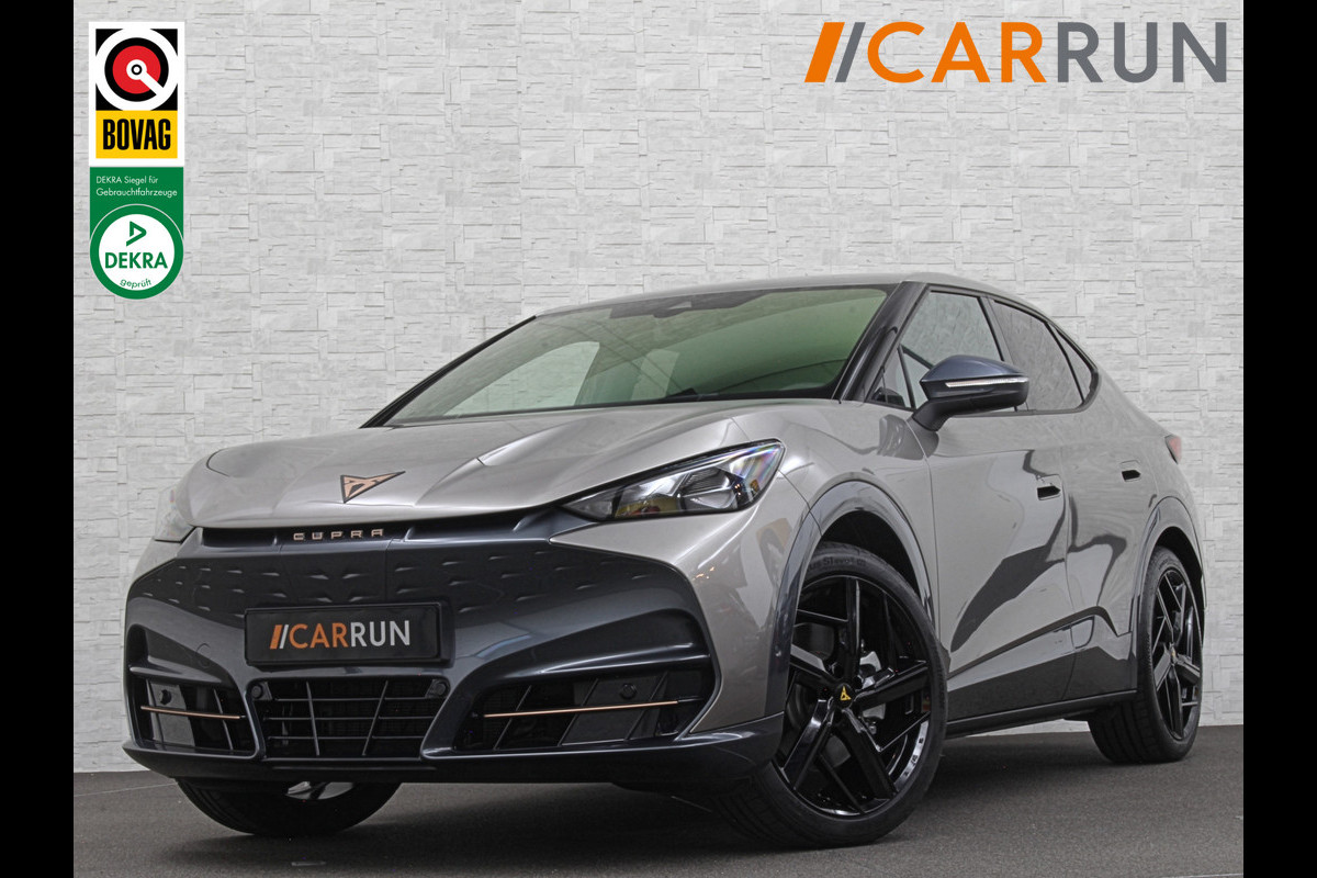 CUPRA Tavascan 286pk 77 kWh | Nieuw! | Winter-Pack | Warmtepomp | Verlengde Fabrieksgarantie | 7x Op Voorraad | Adaptive Cruise Control | 3-Zone Clima | Verwarmde Voorruit | Keyless-Entry | Sfeerverlichting | Stoelverwarming | Carplay | Stuurverwarming | Getint Glas | 19 inch | Lane-Assist | Camera | Draadloos Laden |