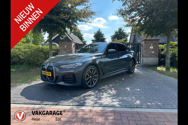 BMW i4 eDrive40 High Executive 84 kWh | M-Pakket | Schuifdak | Cruise Control adaptief met Stop&Go | NL-Auto |