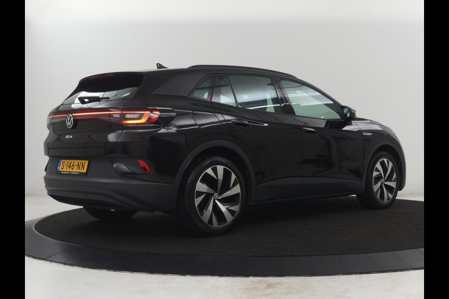 Volkswagen ID.4 Pro 77 kWh | SOH 95,4% | Adaptive cruise | Lane assist | Stuur/stoelverwarming | Climate control | Sfeerverlichting | Caplay | Park assist | 20" velgen