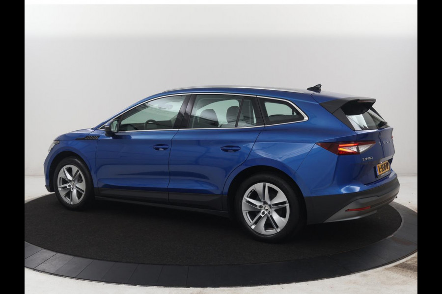 Škoda Enyaq iV 60 | SOH 90,7% | Leder | Stoelverwarming | Head-up | Climate control | Navigatie | Carplay | Sfeerverlichting | Camera | Park assist | EV