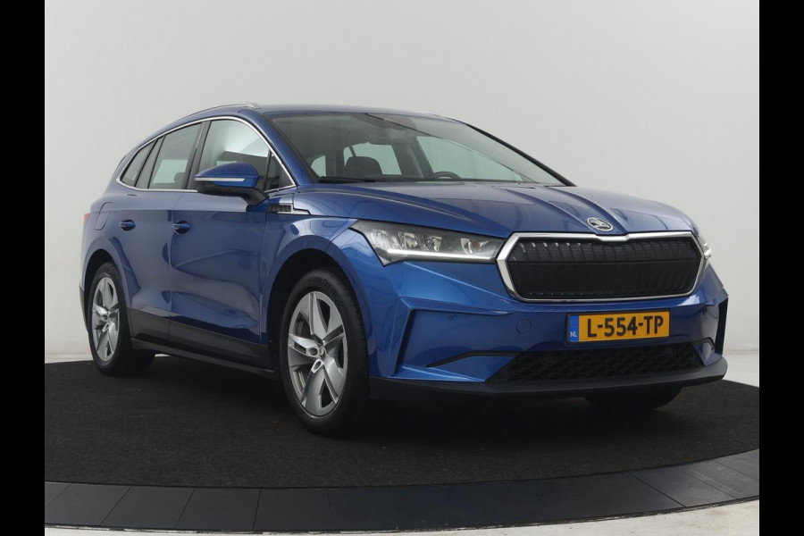Škoda Enyaq iV 60 | SOH 90,7% | Leder | Stoelverwarming | Head-up | Climate control | Navigatie | Carplay | Sfeerverlichting | Camera | Park assist | EV