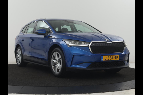 Škoda Enyaq iV 60 | SOH 90,7% | Leder | Stoelverwarming | Head-up | Climate control | Navigatie | Carplay | Sfeerverlichting | Camera | Park assist | EV