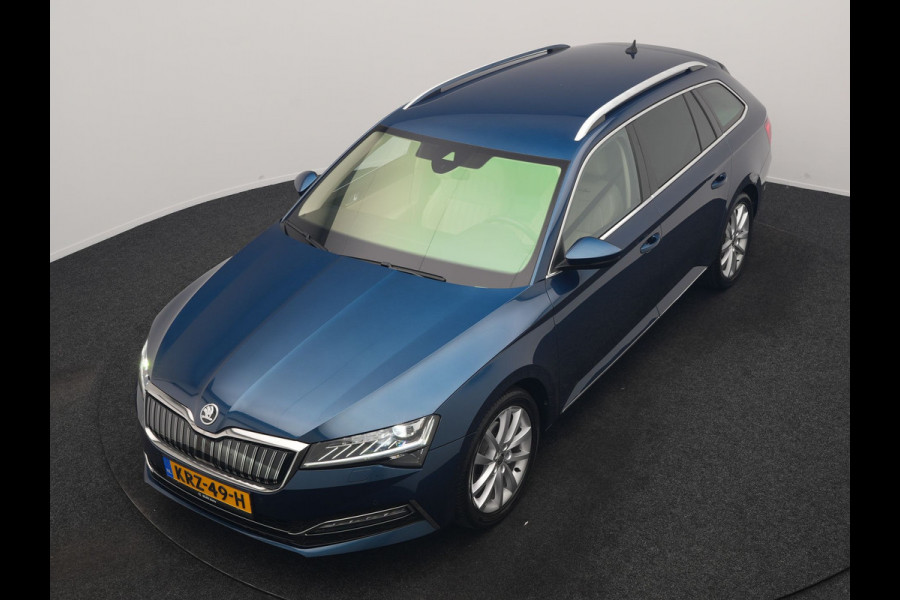 Škoda Superb Combi 1.4 TSI iV Laurin & Klement PHEV 218pk Dealer O.H. | Trekhaak Af Fabriek | Adaptive Cruise | Camera | Lederen Comfortzetels Memory & Verwarmd | Stuur Verwarmd | Canton Audio | Blis | Keyless | Apple Carplay | Crystal LED | Navigatie | DAB | Plug In Hybrid |