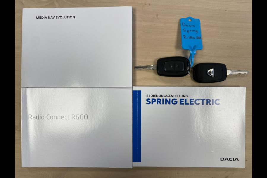 Dacia Spring Comfort Plus (Orange Pack) 27 kWh|AIRCO|LEDER|CARPLAY|CRUISE CTRL|ACHTERUITRIJCAMERA|NAVI|PARKEERSENS|LMV|NIEUWSTAAT|