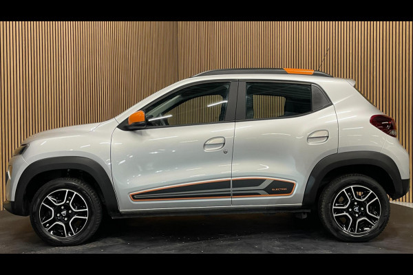 Dacia Spring Comfort Plus (Orange Pack) 27 kWh|AIRCO|LEDER|CARPLAY|CRUISE CTRL|ACHTERUITRIJCAMERA|NAVI|PARKEERSENS|LMV|NIEUWSTAAT|