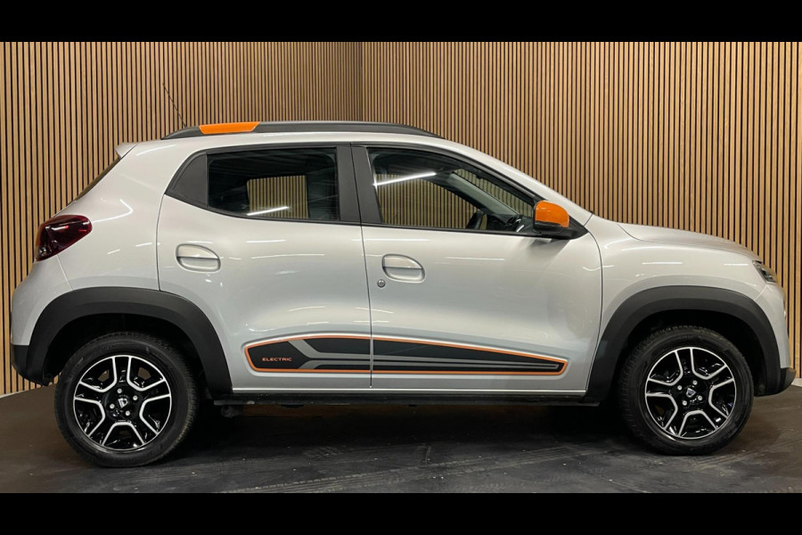 Dacia Spring Comfort Plus (Orange Pack) 27 kWh|AIRCO|LEDER|CARPLAY|CRUISE CTRL|ACHTERUITRIJCAMERA|NAVI|PARKEERSENS|LMV|NIEUWSTAAT|