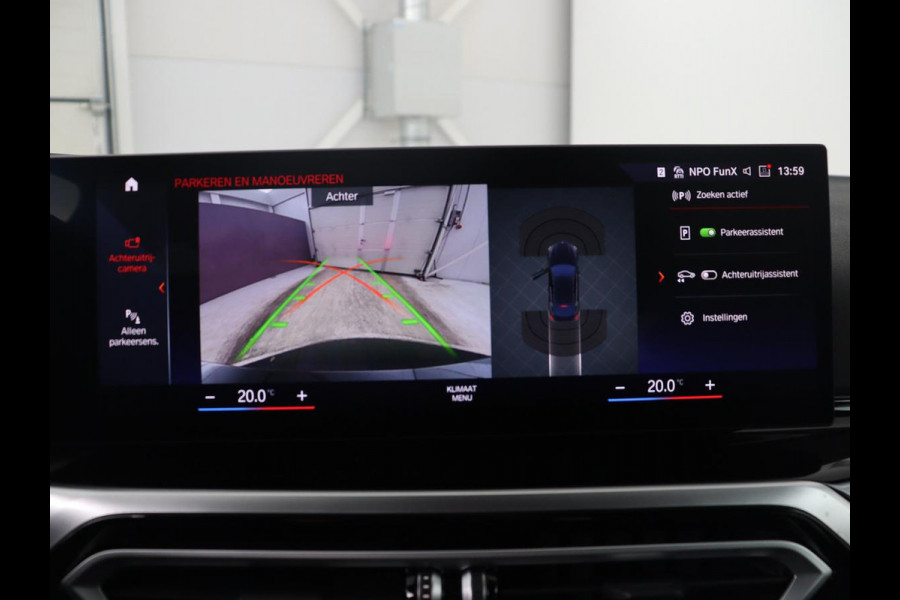 BMW i4 eDrive40 High Executive 84 kWh | SOH 98,7% | Leder | Adaptive cruise | Dodehoek detectie | Head-up | Stoelverwarming | Sfeerverlichting | Carplay | 3 zone klimaat | Camera | Park assist | Elektrische achterklep