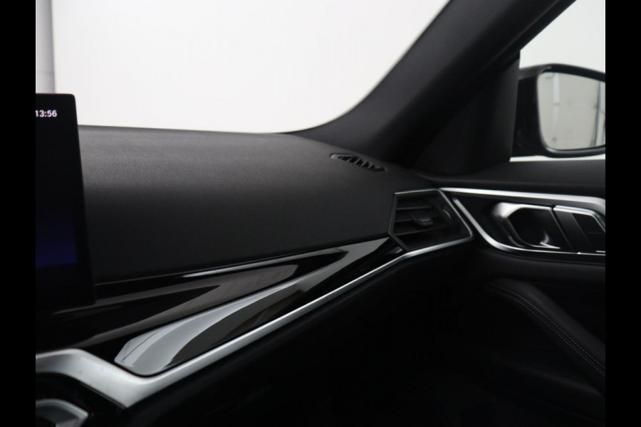 BMW i4 eDrive40 High Executive 84 kWh | SOH 98,7% | Leder | Adaptive cruise | Dodehoek detectie | Head-up | Stoelverwarming | Sfeerverlichting | Carplay | 3 zone klimaat | Camera | Park assist | Elektrische achterklep