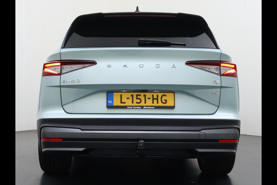 Škoda ENYAQ iV 80 204PK Leder Trekhaak Adap.Cruise Stoel+Stuurverwarming Camera 3-Zone Ecc Elek.Achterklep Keyless Apple Carplay Android Auto N Comfort plus-pakket  Assistentie Pakket Climate-pakket P-Assist Lmv Led Isofix Privacy Glas 1.000KG Trekgewicht 1e Eigenaar Origineel Nederlandse Auto