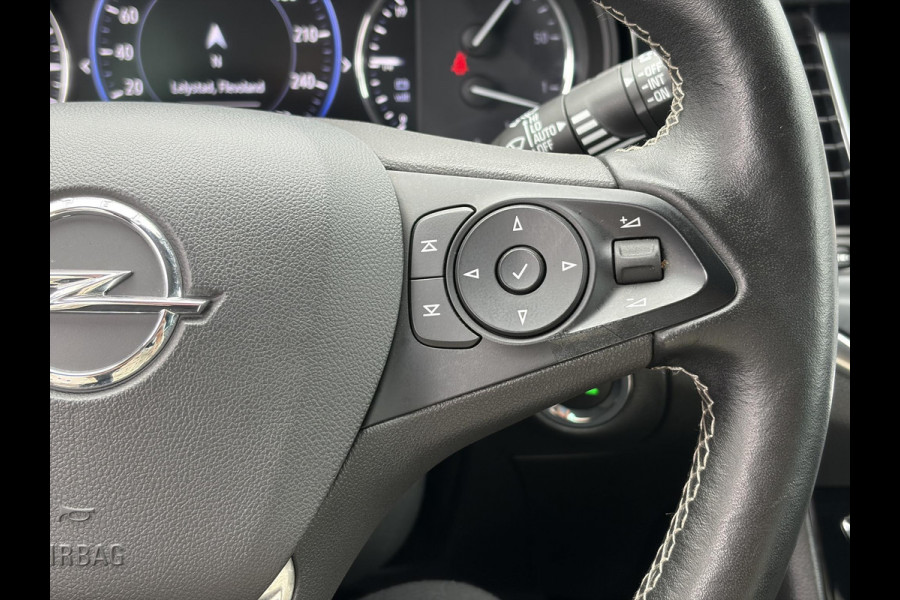 Opel Astra Sports Tourer 1.2 Elegance ✓131pk✓2e Eigenaar✓Camera✓Carplay✓6 Bak✓Stoelverw✓Stuurverw✓Pdc V+A✓Recent beurt gehad✓Clima✓Cruise✓Halfleder✓Keyless✓N.A.P✓Lm velgen✓Rijstrooksensor✓Apk tot 07-2027